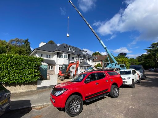 Lifting Ton Bags Over The House