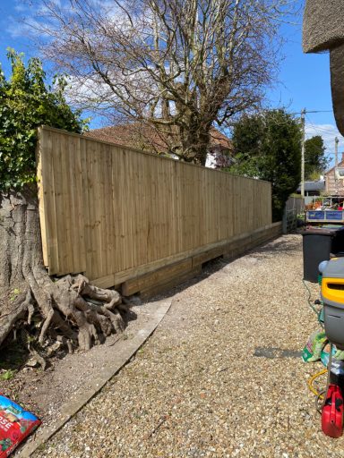 Close Board Fence & Sleeper Retaining Wall 